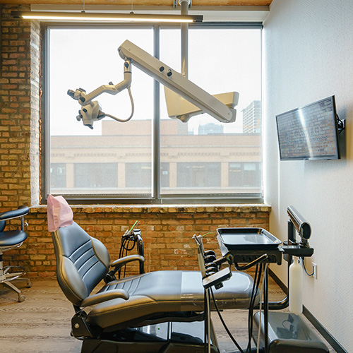 GLASS ACT: Ample windows and (at left) interior partitions help ensure a bright, airy office regardless of the weather outside.