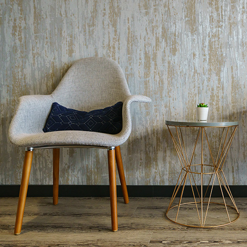  SEATS OF POWER: Reception-area chairs exemplify Cameo Dental Specialists’ prevailing design aesthetic: midcentury, comfy, just a little bit funky.