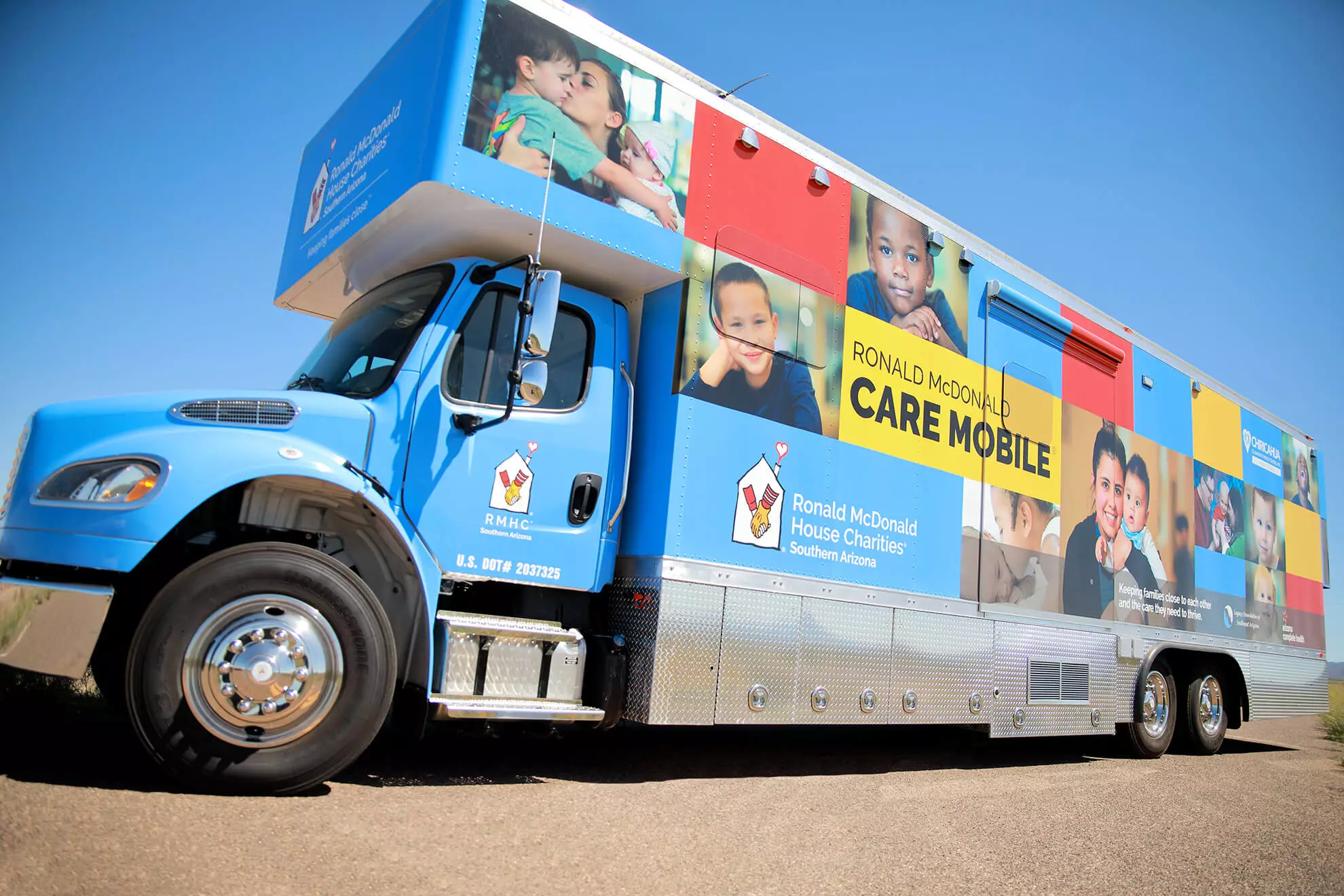 THEY’RE LOVIN’ IT: (Clockwise from top left) Dental assistant Denise Godoy welcomes a new young patient to the funhouse; hygienist Terri Kibler with a child; the mobile clinic, rolling through the desert Southwest