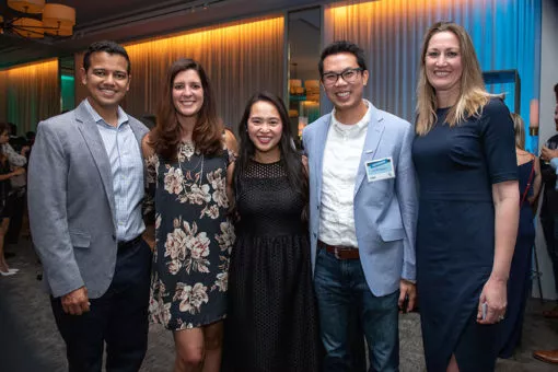 honoree Dr. Mark M. Da- woud (left) and his wife, Julia; honoree Dr. Bar Nguyen (second from right) and his wife, Katie; and Benco Dental’s Anna DuHamel (far right)