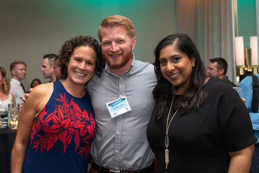 honorees Drs. Charlie Clark (center) and Onika Patel (right) with Dr. Clark’s wife, Jessica