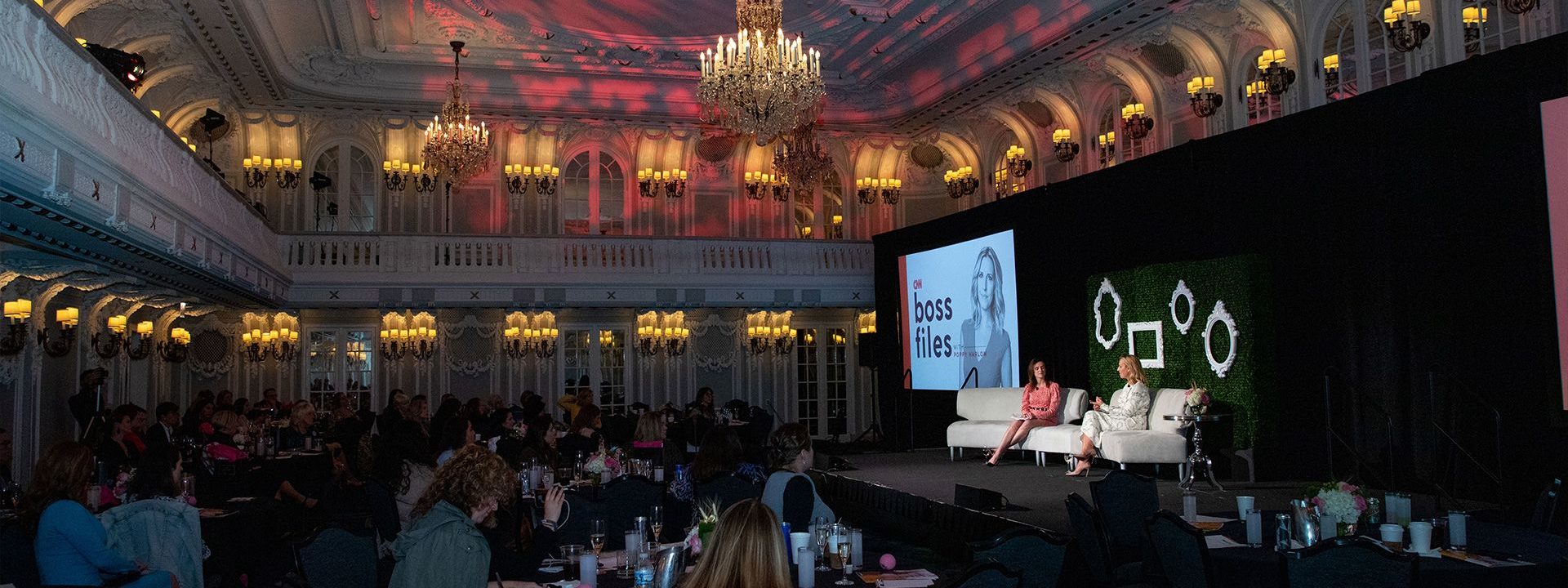 Dr. Vladana Babcic Tal onstage (left) with CNN’s Poppy Harlow;