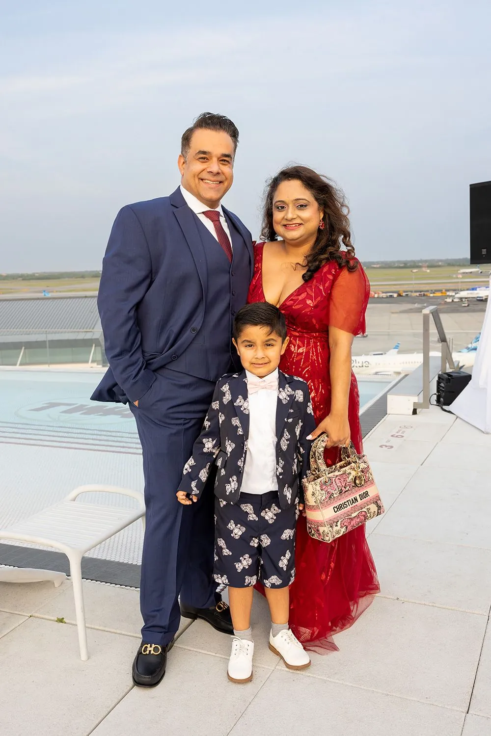 Dr. Rahul Sharma and 4040 Dr. Rekha Joshi with their son, Rajveer;