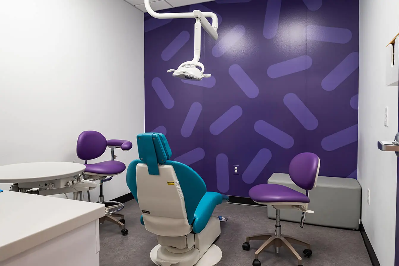 Purple reign: “Based on the existing brand colors, we chose an ice cream shop motif for the environmental graphics,” says Benco Dental’s Allison Simenkiewicz. 