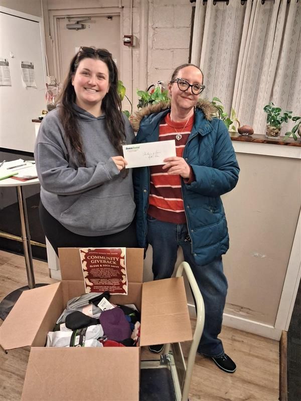 LOCAL WARMING: From company headquarters in Pittston, Pennsylvania, Benco associates organized a gloves-and-socks drive benefiting Ruth’s Place, a women’s shelter in Wilkes-Barre. Benco’s Alice Morris (right) delivered the winter essentials along with a $933 associate-raised contribution matched by the Benco Family Foundation. 