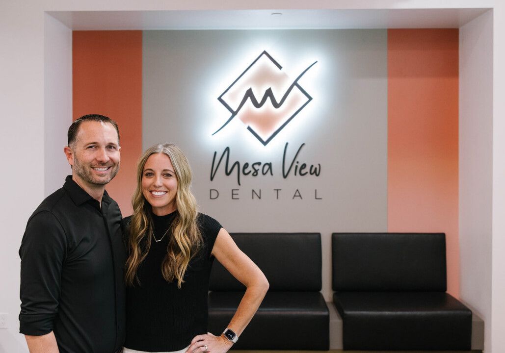 Warm welcome: Positioned for visibility throughout the building and even from the parking lot, the logo wall serves as both a focal point and a visual anchor connecting the reception area to the clinical spaces beyond. 