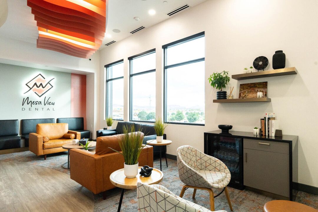 Guiding lights: Patterns in the flooring subtly guide patients through the space. Curving transitions between carpet and luxury vinyl tile improve durability while reinforcing the flowing forms found throughout the office. 