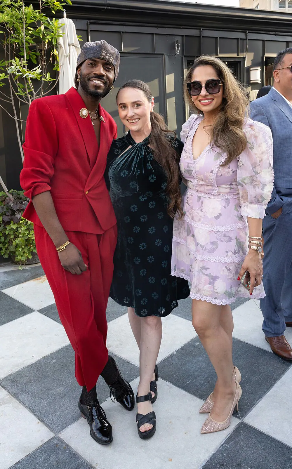 (10, from left) fashion director and producer Jeffrey Ampratwum with 4040 Drs. Laura Lawrence and Navreet K. Sidhu;