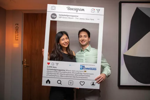 honoree Dr. Ryan L. Mendro—who celebrated his fortieth birthday during the event, just getting in under the wire for inclusion—with his wife, Dr. Lucia Roca Mendro, fresh out of the “Bencogram” booth