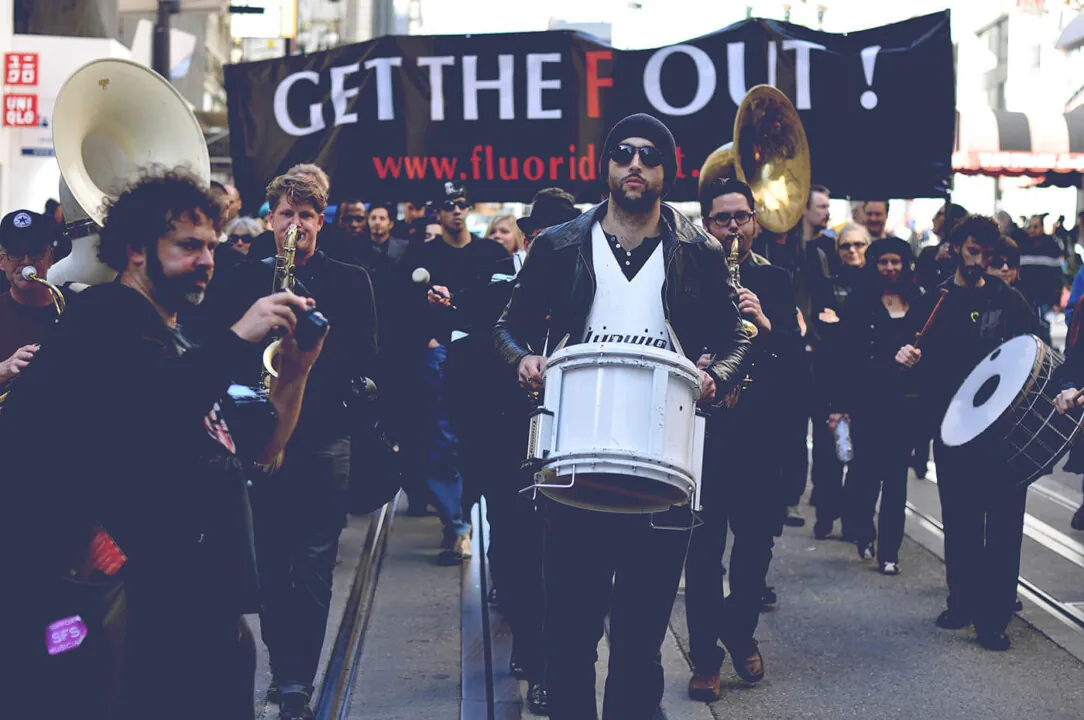 Caries on, my wayward son: Anti-fluoride protesters raise a musical ruckus in San Francisco, February 2013.