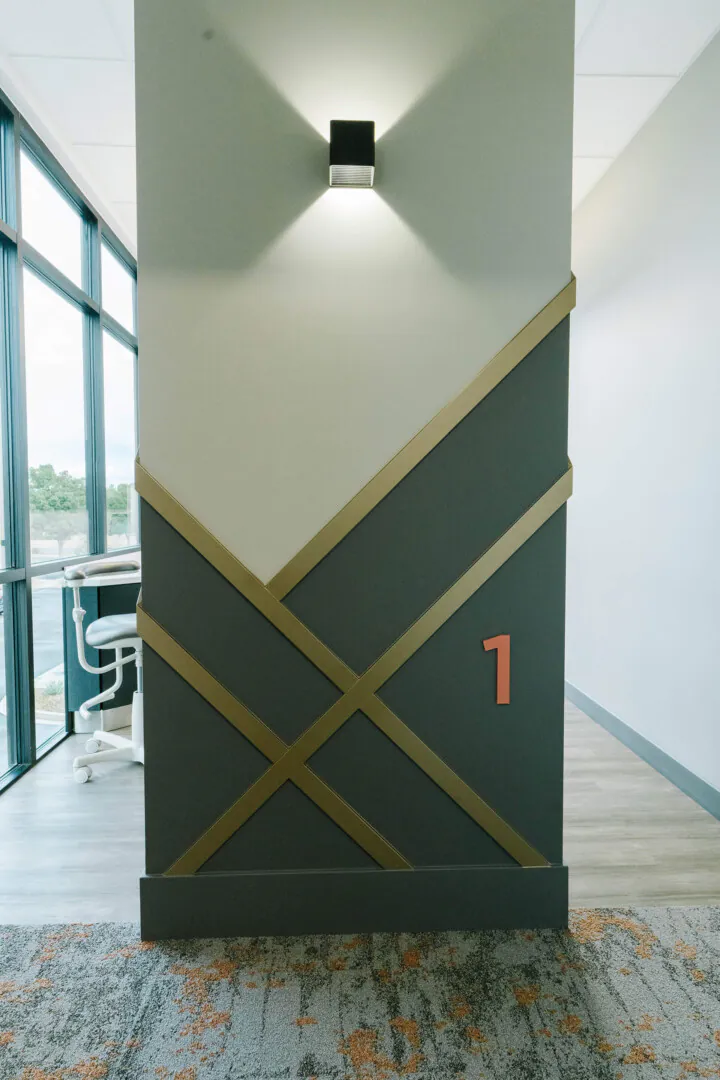 Repurposed refinement: Leftover material from the custom 3form slats and wall installations was repurposed into room numbers and decorative accents.